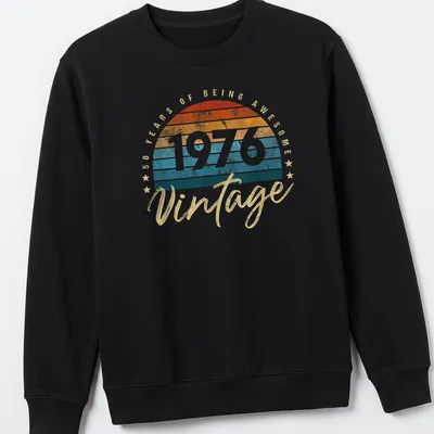 Retro distressed shirt celebrating 50 years of being awesome in orange and teal — printed on a unisex sweatshirt