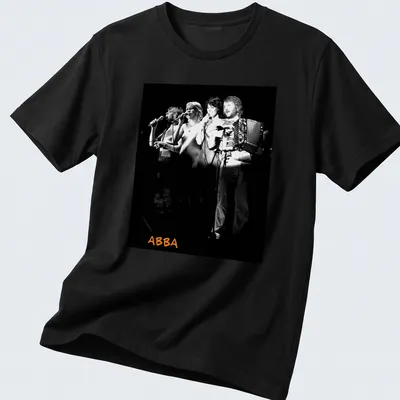 Black and white photo of ABBA performing with orange accents — printed on a unisex t-shirt