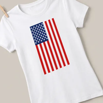 Flat design illustration of the American flag in red, white, and blue — printed on a women's shirt