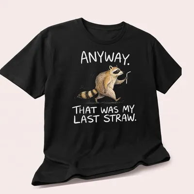 Illustration of a funny raccoon with humorous text about frustration. — printed on a unisex t-shirt (angled view)