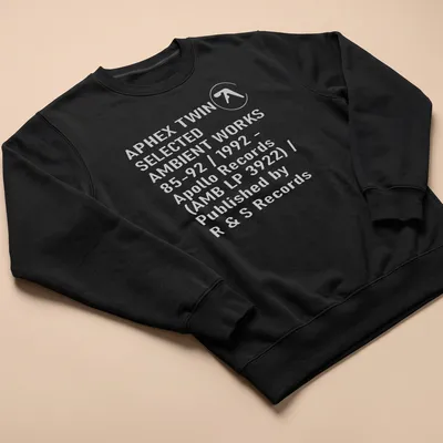 Minimalist black and white t-shirt featuring Aphex Twin album details — printed on a unisex sweatshirt