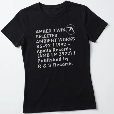 Minimalist black and white t-shirt featuring Aphex Twin album details — printed on a women's shirt