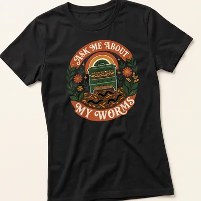 Vintage botanical tee featuring a vermicomposting bin with worms and colorful text — printed on a women's shirt