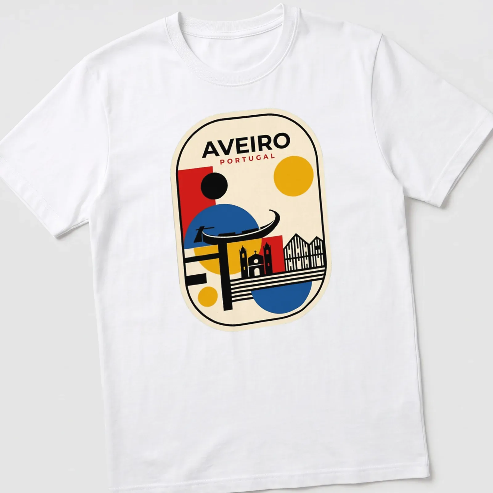 Geometric skyline of Aveiro, Portugal with bold text above in red, blue, yellow, black, and cream. — printed on a unisex t-shirt