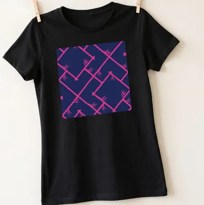 Chinoiserie style bamboo lattice pattern in navy and hot pink — printed on a women's shirt