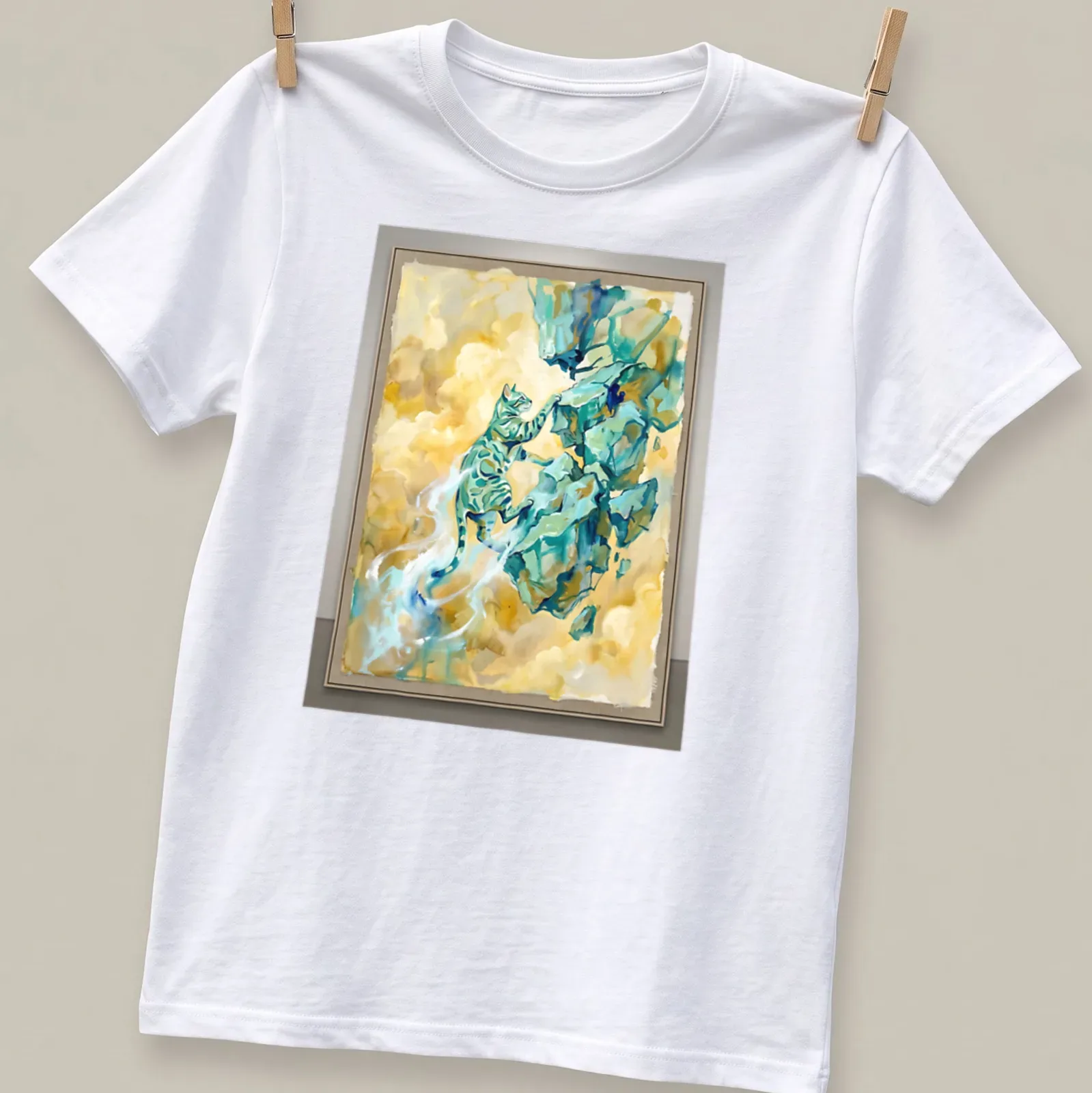Abstract watercolor print of a Bengal cat climbing over rocks in turquoise and yellow — printed on a unisex t-shirt