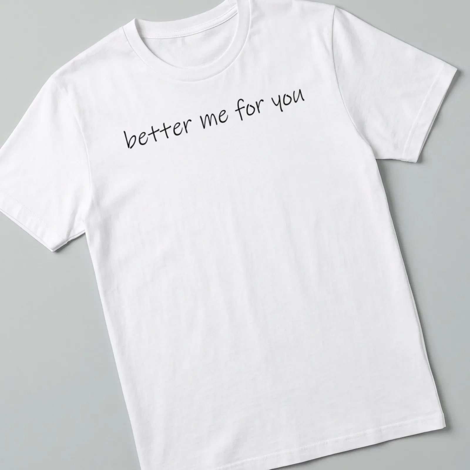 Inspirational quote t-shirt with handwritten script saying better me for you in black — printed on a unisex t-shirt