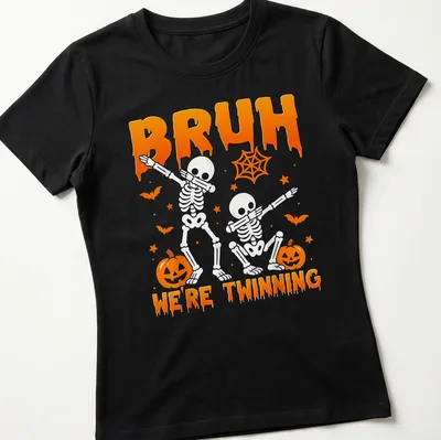 Playful cartoon skeletons with the text Bruh We're Twinning in orange and black — printed on a women's shirt