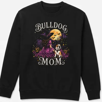Whimsical illustration of a bulldog as a witch with crescent moon, vibrant colors — printed on a unisex sweatshirt