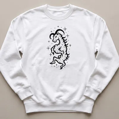 Bold black ink tattoo of a Capricorn Sea Goat in black and white — printed on a unisex sweatshirt