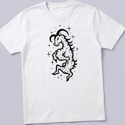 Bold black ink tattoo of a Capricorn Sea Goat in black and white — printed on a unisex t-shirt