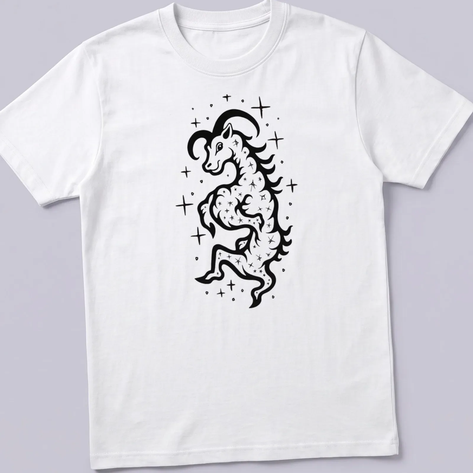 Bold black ink tattoo of a Capricorn Sea Goat in black and white — printed on a unisex t-shirt