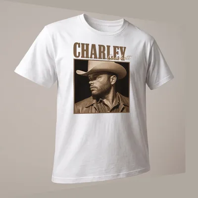 Sepia-tone portrait of cowboy Charley Crockett on — printed on a unisex t-shirt (angled view)