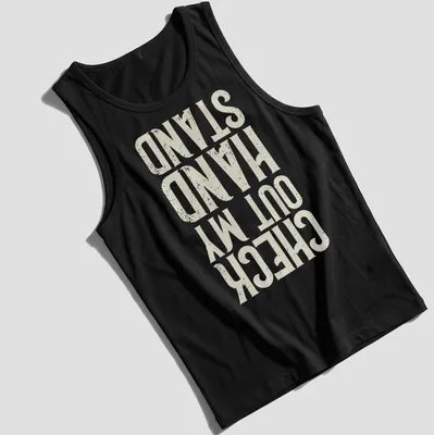 Distressed typography t-shirt featuring the phrase Check Out My Hand Stand in white, cream, and gold. — printed on a tank top
