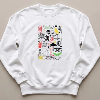 Vintage collage of Cocteau Twins text with skulls and butterflies in vibrant colors — printed on a unisex sweatshirt