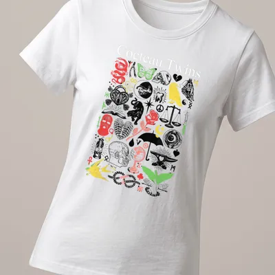Vintage collage of Cocteau Twins text with skulls and butterflies in vibrant colors — printed on a women's shirt