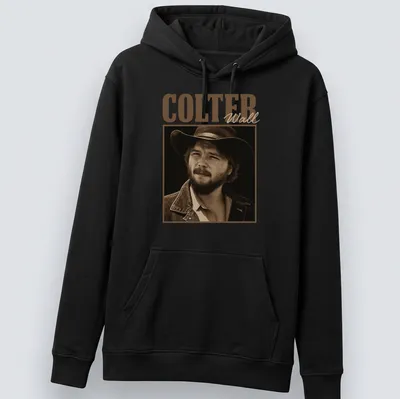 Vintage sepia print of a cowboy with a hat and the text COLTER Wall — printed on a unisex hoodie