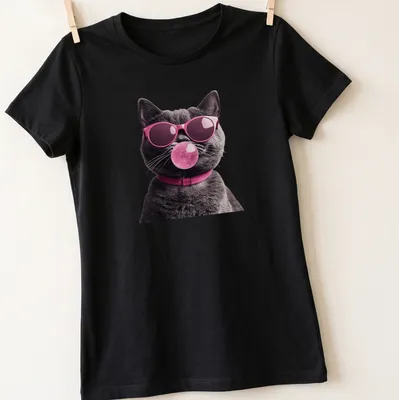 Realistic illustration of a grey cat in sunglasses blowing pink bubblegum — printed on a women's shirt