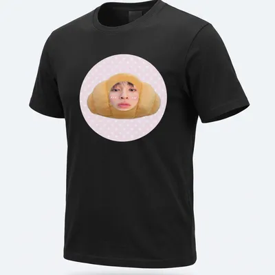 Kawaii cute croissant t-shirt featuring a smiling croissant character in pink and beige