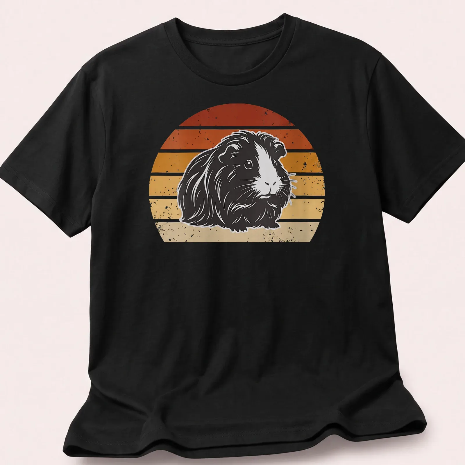 Retro distressed print of a long-haired guinea pig surrounded by rainbow colors — printed on a unisex t-shirt