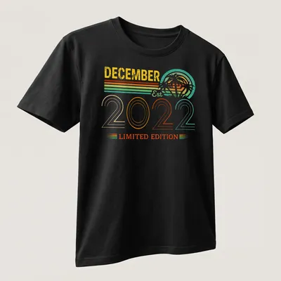 Retro design of palm trees with December Est 2022 Limited Edition text in bright colors. — printed on a unisex t-shirt (angled view)