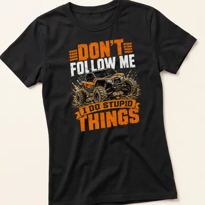 Grunge style t-shirt featuring off-road vehicle and humorous text about driving. — printed on a women's shirt