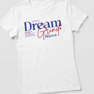 Bold motivational typography shirt with inspiring text in blue, red, and white — printed on a women's shirt