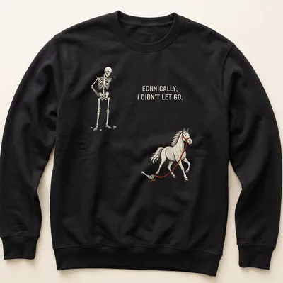 Illustration of a playful skeleton holding a horse with humorous text — printed on a unisex sweatshirt