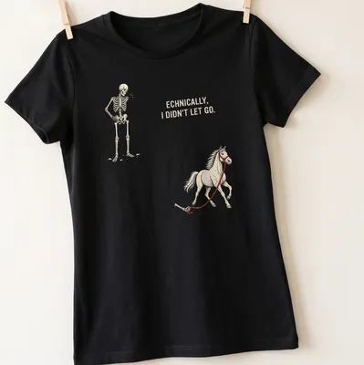 Illustration of a playful skeleton holding a horse with humorous text — printed on a women's shirt