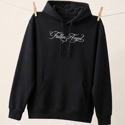Illustrative T-shirt featuring a fallen angel character named Jennie in black and white — printed on a unisex hoodie