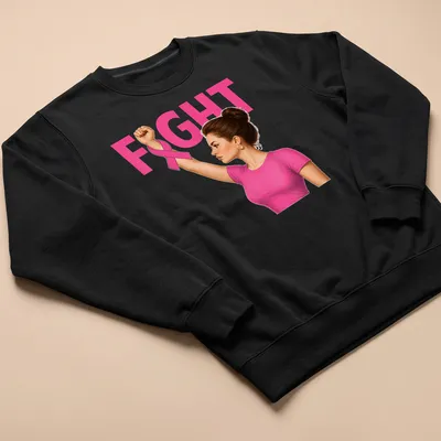 Realistic illustration of a woman raising her fist with a pink ribbon, featuring the word 'FIGHT' — printed on a unisex sweatshirt