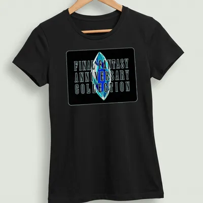 Bold typography featuring Final Fantasy Anniversary Collection with a crystal motif — printed on a women's shirt