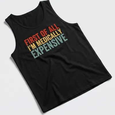 Bold retro humor shirt with text 'First Of All I’m Medically Expensive' in bright colors — printed on a tank top