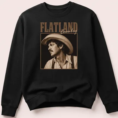 Vintage sepia cowboy portrait with 'FLATLAND Cavalry' text in classic font — printed on a unisex sweatshirt