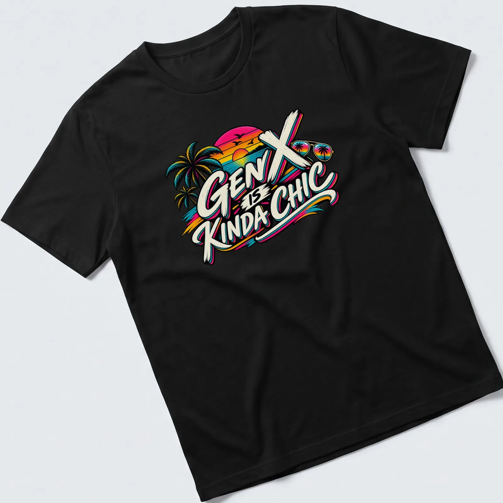 Retro palm trees and sunset design with text 'Gen X is Kinda Chic' in various colors — printed on a unisex t-shirt