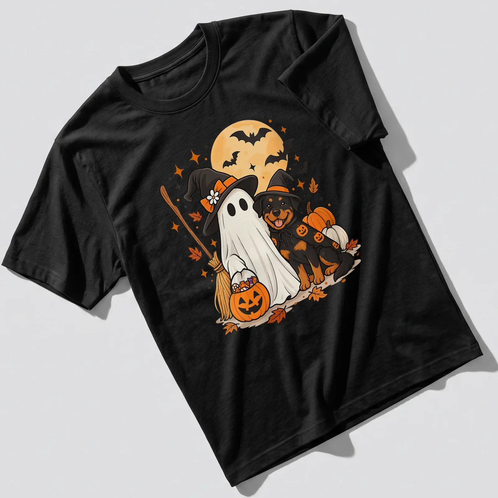 Kawaii cartoon of a ghost dog and Rottweiler in witch hats for Halloween — printed on a unisex t-shirt