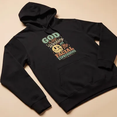 Funny emoji face with text about expressions in pastel colors — printed on a unisex hoodie