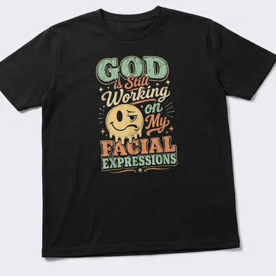 Funny emoji face with text about expressions in pastel colors — printed on a unisex t-shirt