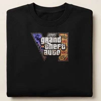 Graffiti-style Grand Theft Auto logo t-shirt in black, purple, brown, white, and grey — printed on a unisex sweatshirt