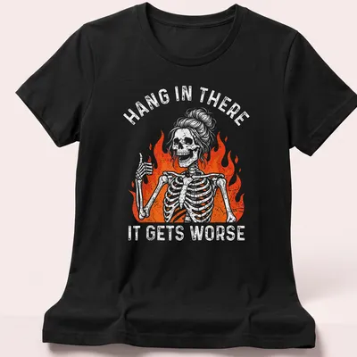 Vintage distressed shirt featuring a skeleton in flames with humorous text. — printed on a women's shirt