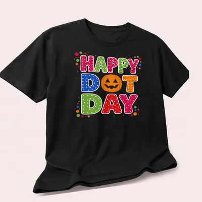 Colorful pumpkin design with Happy Dot Day text in retro polka dot style — printed on a unisex t-shirt (angled view)