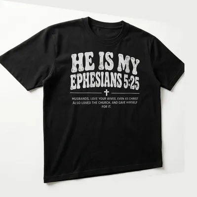 Bold typography Christian couple shirt with Ephesians 5:25 text — printed on a unisex t-shirt (angled view)