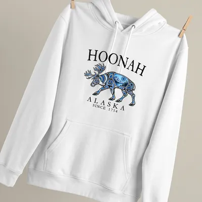 Tribal art T-shirt featuring a caribou and the text Hoonah Alaska Since 1754 — printed on a unisex hoodie
