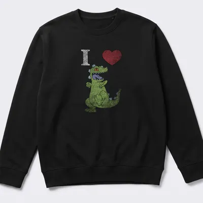 Cartoon dancing dinosaur with text 'I Heart' in playful colors — printed on a unisex sweatshirt