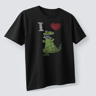 Cartoon dancing dinosaur with text 'I Heart' in playful colors — printed on a unisex t-shirt (angled view)
