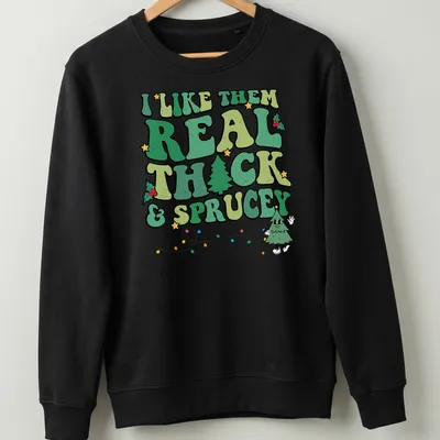Funny Christmas tree t-shirt with retro text about liking thick and sprucey trees — printed on a unisex sweatshirt