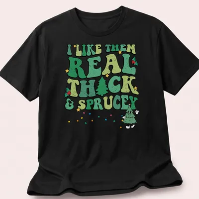Funny Christmas tree t-shirt with retro text about liking thick and sprucey trees — printed on a unisex t-shirt
