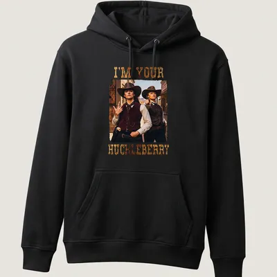 Vintage T-shirt featuring two cowgirls and the words I'm Your Huckleberry — printed on a unisex hoodie
