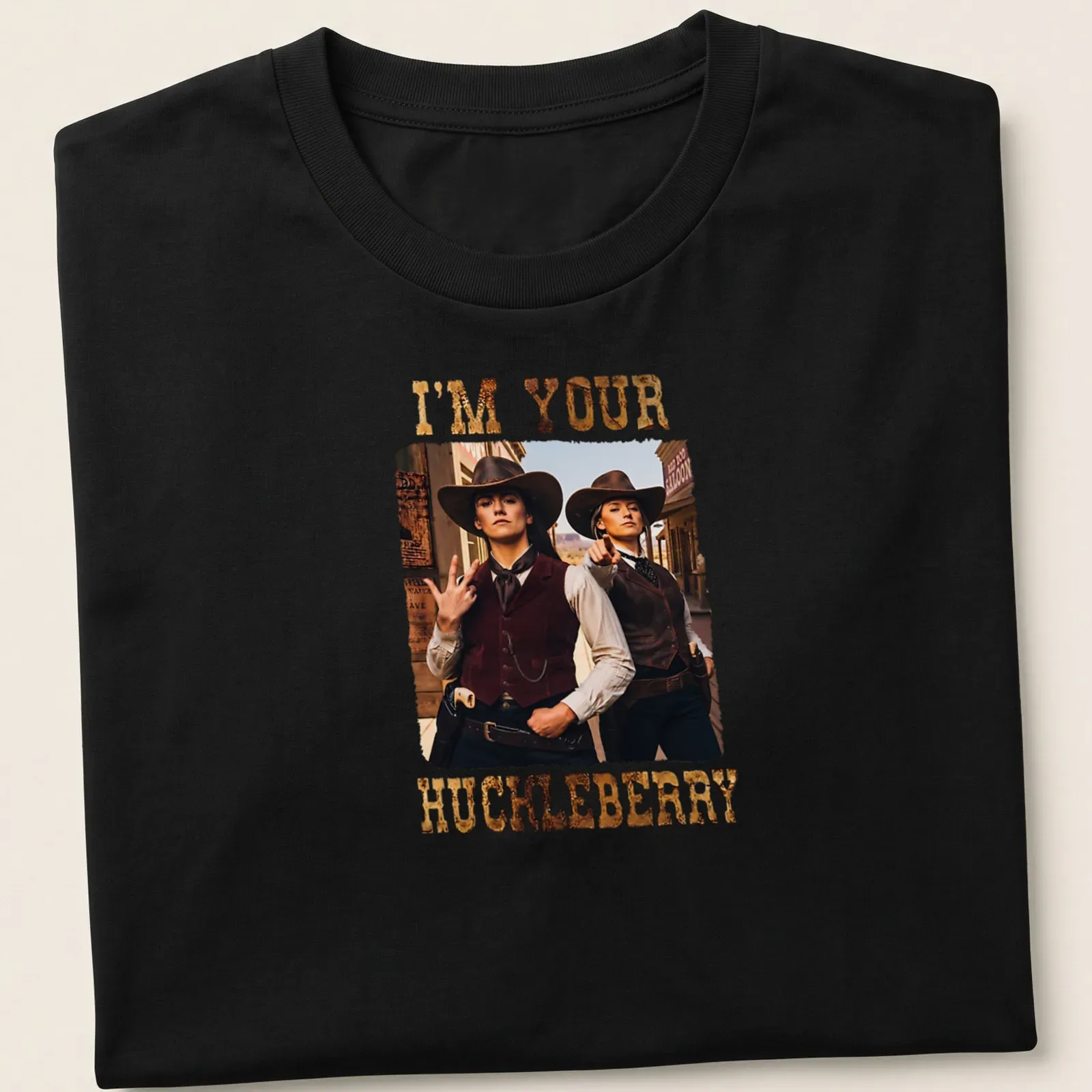 Vintage T-shirt featuring two cowgirls and the words I'm Your Huckleberry — printed on a unisex t-shirt