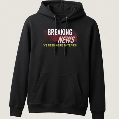 Bold Breaking News t-shirt celebrating 30 years at work with modern typography — printed on a unisex hoodie